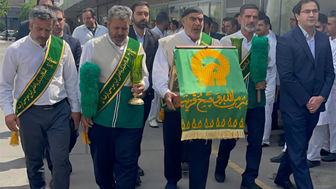مراسم استقبال از خادمیاران رضوی و پرچم متبرک حرم مطهر امام رضا علیه السلام در شرکت داروسازي اسوه